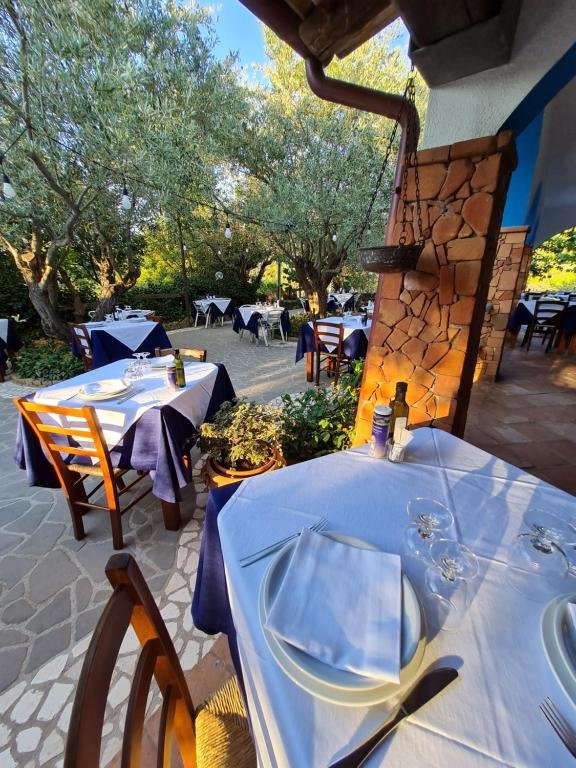 Sardinië restaurants lange tafels